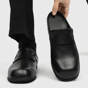 Men’s Black Minimalist Leather Square‑Toe Mules with subtle eyelet detail for sleek mature style. Crafted from soft faux leather for premium comfort, slim lightweight sole eases long‑wear fatigue.