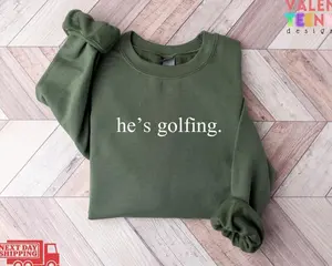 He's Golfing Sweatshirt, Golfing Sweater, Golfer Wife Crewneck Sweatshirt, Hoodie, Comfort Colors