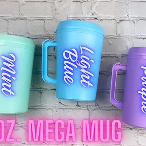 Mega Mug 34oz. Complete with bendy straw and matching lid.