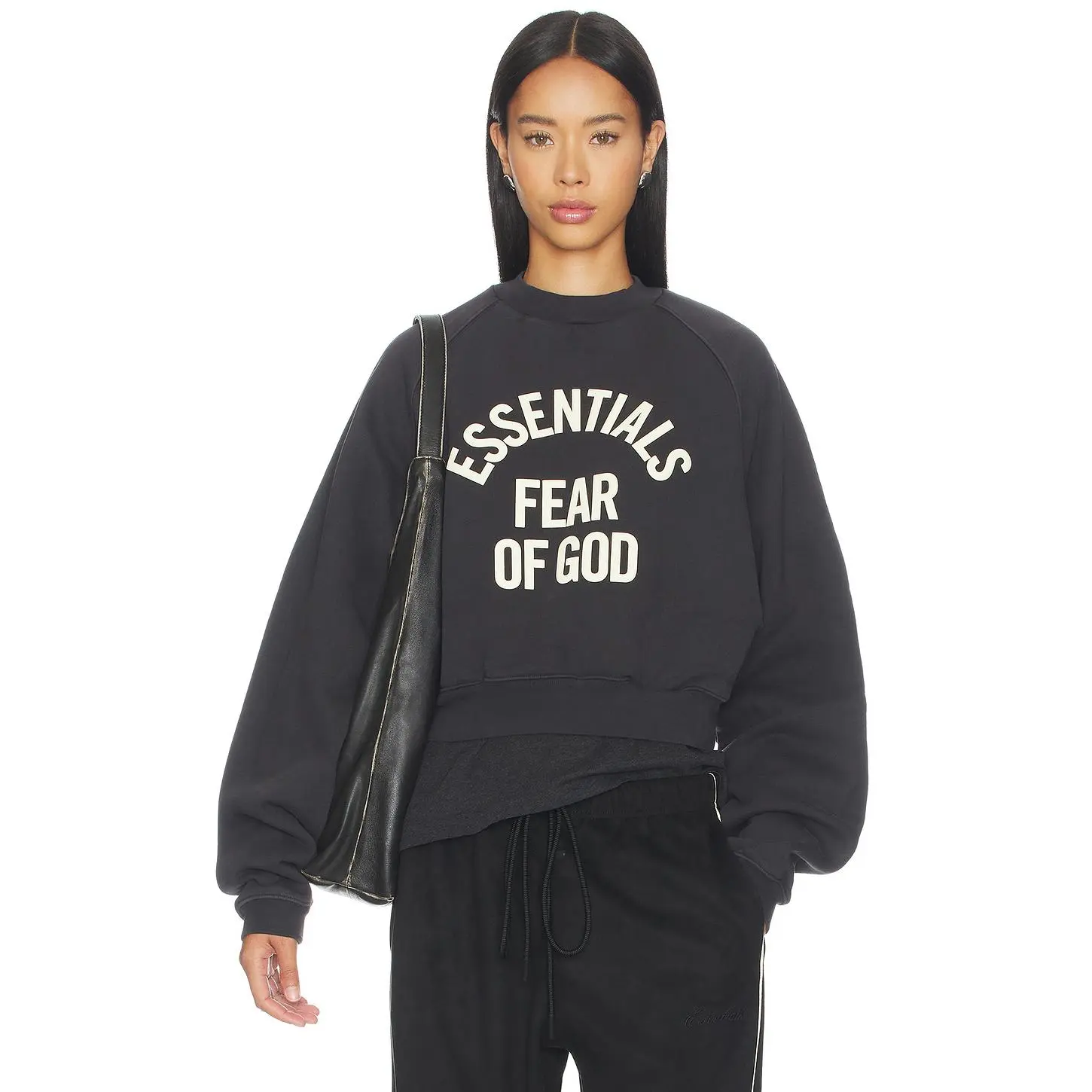 Fear of God ESSENTIALS Campus 90's Cropped Raglan Crewneck in Faded Black Fear of God ESSENTIALS Campus 90's Cropped Raglan Crewneck in Faded Black