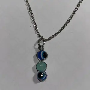 luminous evil eye pendants