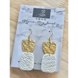 Carrie Dangles - Earrings with Textured Design, Gold and White Colors, and Unique Dangle Style