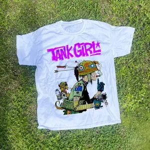 Tank Girl Graphic Tee Rebellious Punk Heroine Smoking And Armed, Tank Girl Cult Comic Movie Aesthetic, Riot Grrrl Energy, Edgy Street Art Style, Alt Girl Fashion, Comic Fan Gift Idea, Unisex Cotton Crewneck T-Shirt Menswear Womenswear Streetwear Top