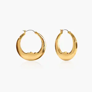 en route Luna Earrings in Gold, Artful Carved Face Crescent Silhouette, Solid Weighty Feel, Whimsical Celestial Fairycore Style, Perfect for Mystical Daily Wear