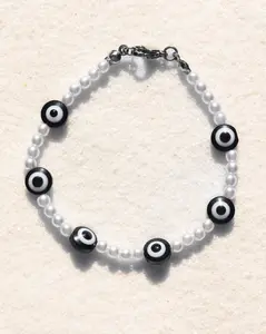 Hand-strung pearl-like bead strand intermixed with black evil eyes ~  Apollo Bracelet