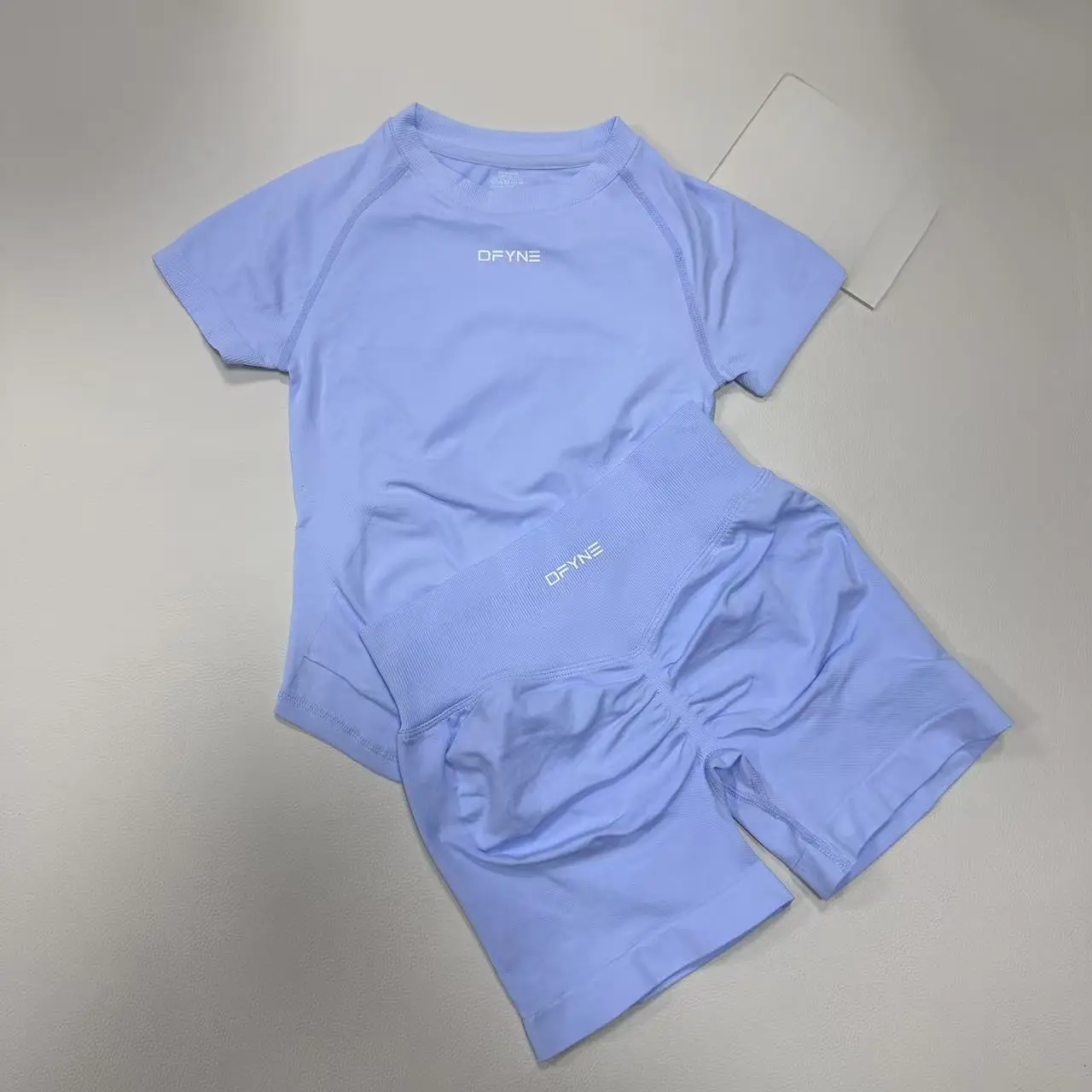 DFYNE Seamless 2 Piece Workout Set - Short Sleeve Athletic Top & High Waisted Scrunch Booty Shorts Bodybuilding Gym Suit