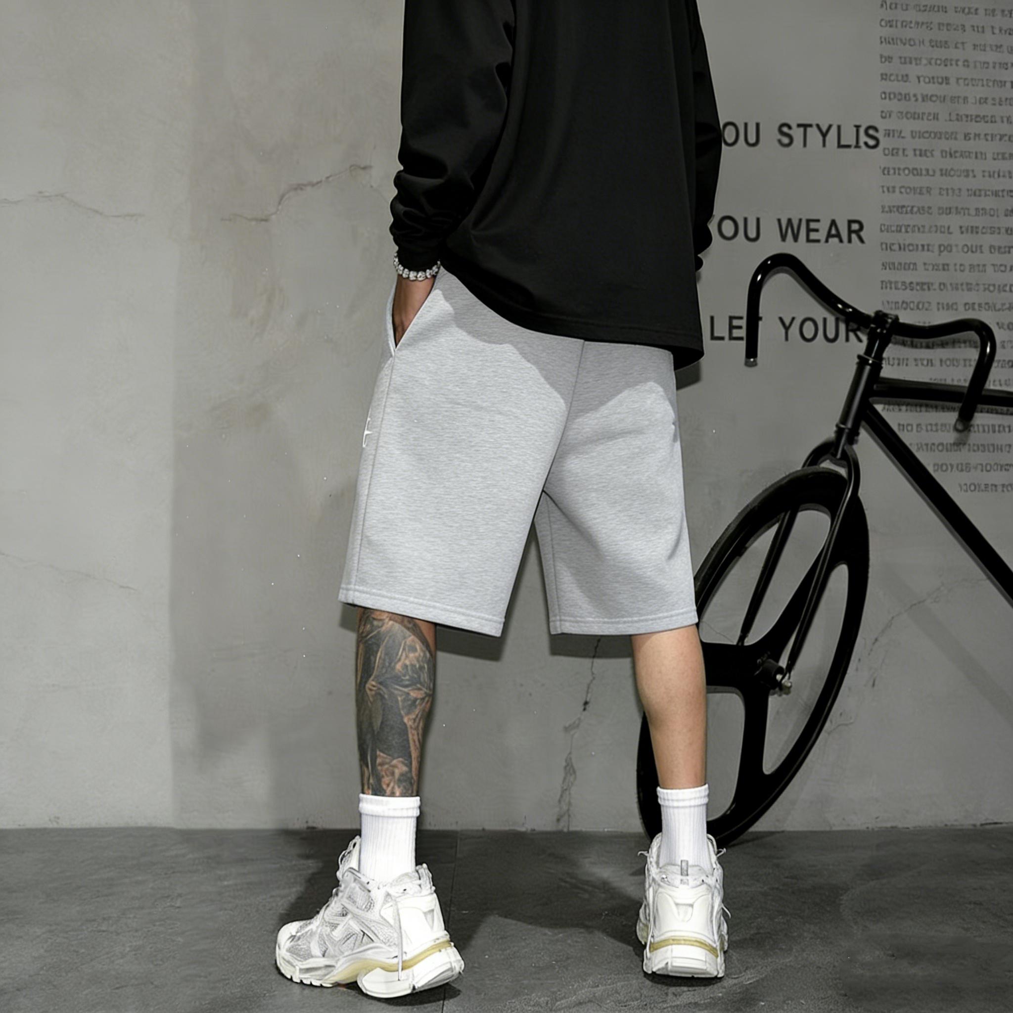 Unisex Y2K street-style sweatpants with logo embroidery; men’s shorts featuring a unique double-waist design; embroidered print loose hip-hop streetwear shorts for summer sports—ideal for everyday wear, comfortable and versatile.