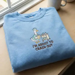 [MADE IN US] Nurse Duck Embroidered Sweatshirt, I’m About to Crash Out Quote, Funny Nurse Burnout, Healthcare Humor Crewneck