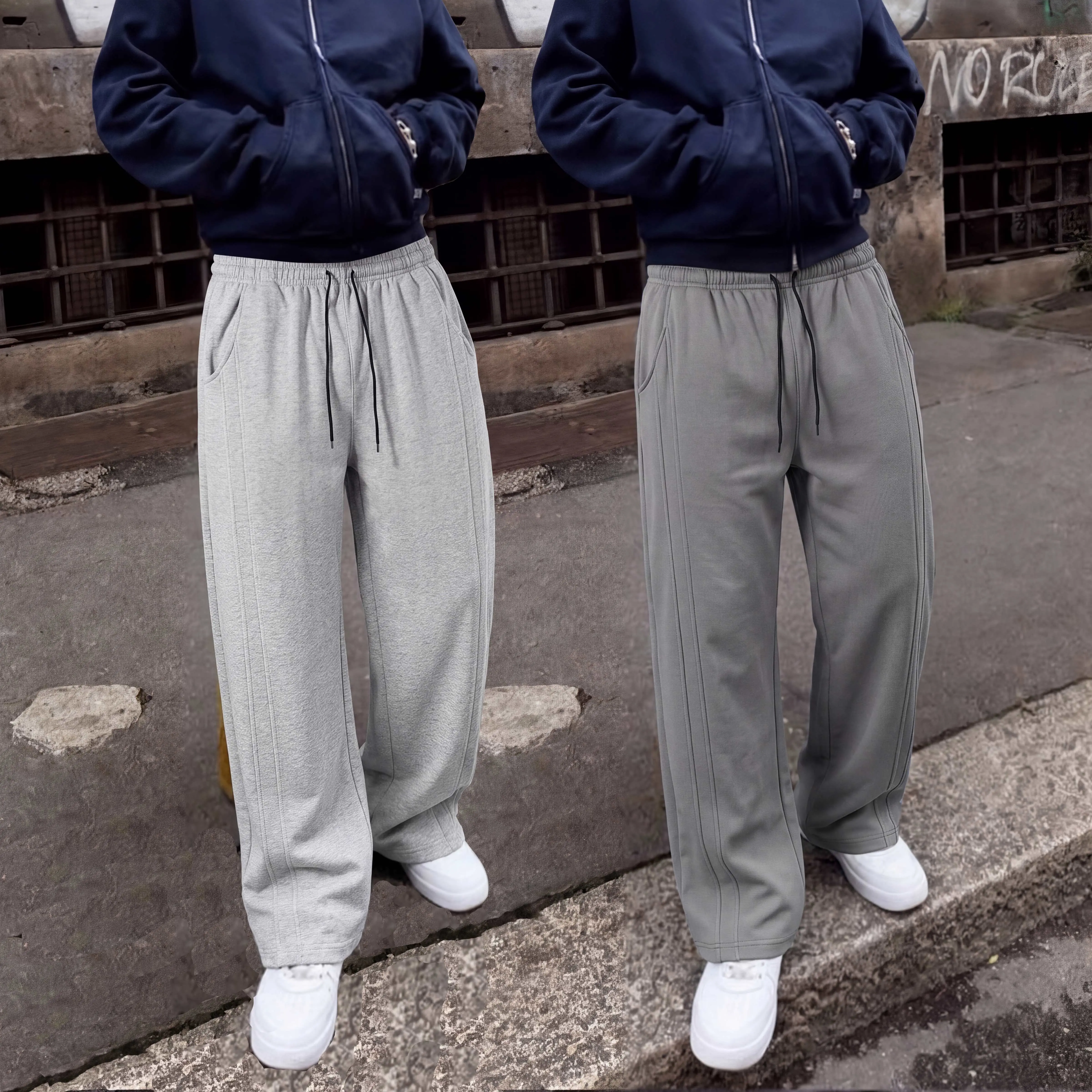 Street-style unisex basic wide-leg athletic knit sweatpants for couples, featuring an elastic waistband with drawstring and side exposed stitching detailing; versatile long pants suitable for commuting and casual wear.