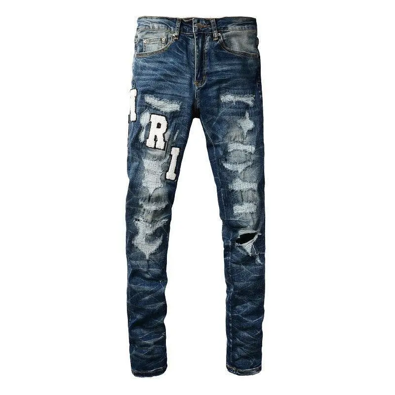 Men’s trendy slim-fit jeans from European and American high street fashion, featuring embroidered lettering, ripped patches, and stretch fabric Men’s trendy slim-fit jeans from European and American high street fashion, featuring embroidered lettering, ripped patches, and stretch fabric