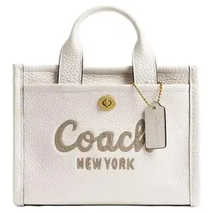 Coach Cargo 20 Leather Tote Bag with Cursive Embroidery and Signature Turn-Lock Closure for Women in White