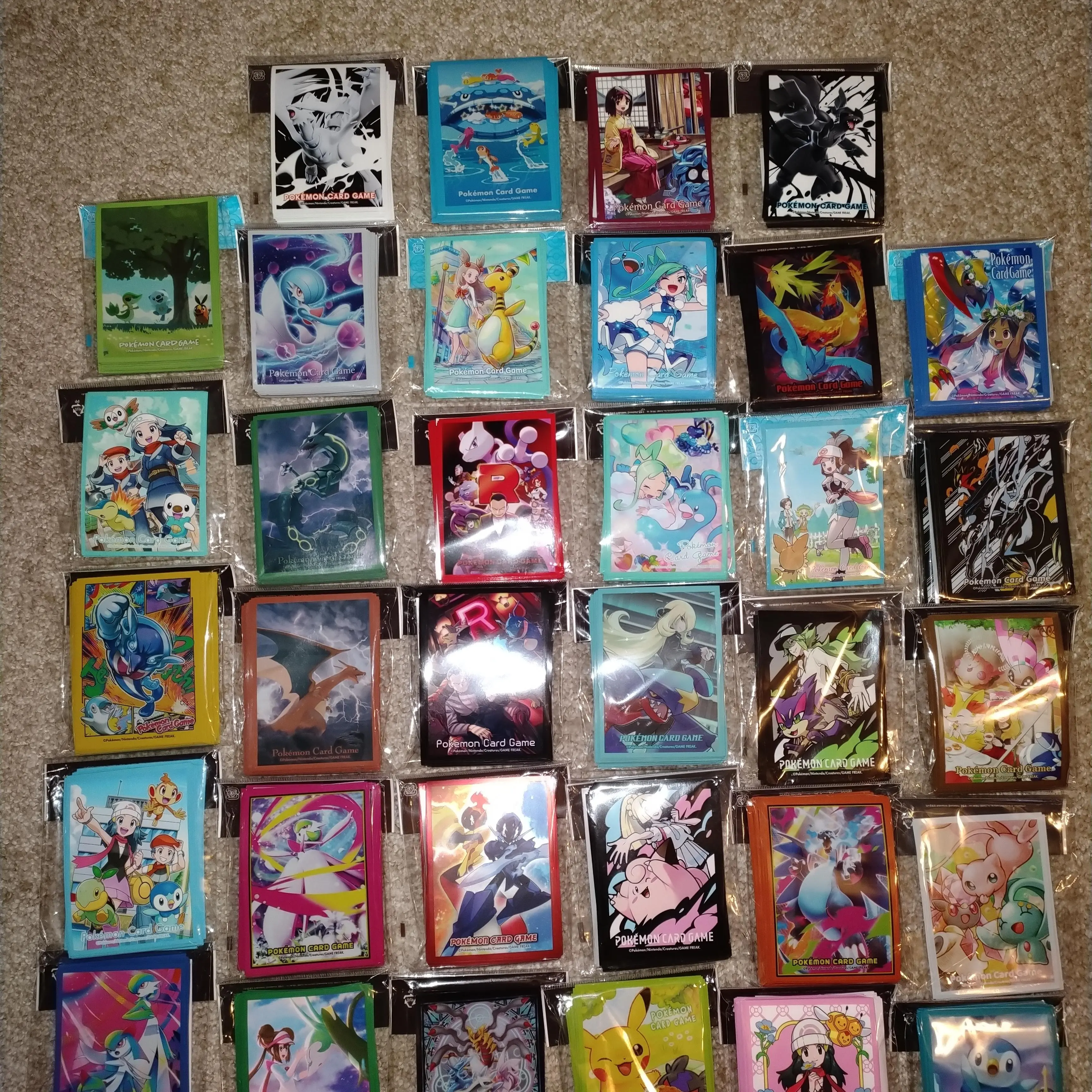 50 Pokemon Card Sleeves Authentic Variety Bundle