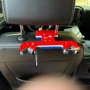 The American - headrest mounted rifle storage system