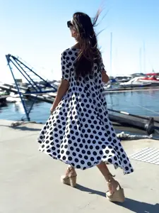 Polka Dots Dress KOSARA - Celebrate the season with a dress that combines playful sophistication with unbeatable comfort.