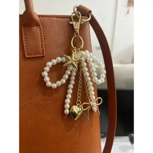 Gentle style pearl bead bag decoration, Bag Charm Keychain, starfish love bow decoration, light luxury texture exquisite style fashion decoration, can be used as a keychain, can be given to friends, lightweight and easy to carry, Fashion Bag Charms