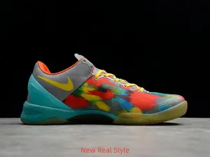 Vibrant multicolor tie-dye low-top collectible sneakers, gradient splash upper with turquoise heel support block