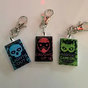 Navessa Allen- Lights Out, Caught Up, & Game On Mini Book keychain