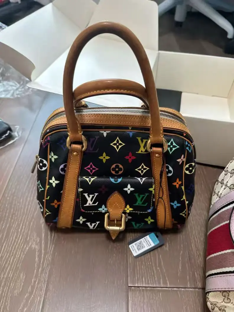 Pre-owned Louis Vuitton leather handbag black monogram multicolor with natural handles. xb298