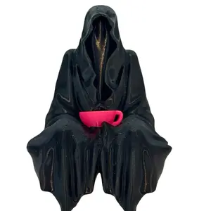 Suriel Tea Book Rest Figurine - Black Cloaked Figure with Tea Cup
