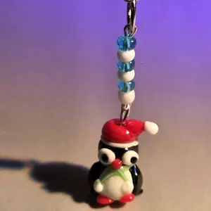 Penguin Keychain with Festive Red Hat and Blue Beaded Charm for Christmas Gifts