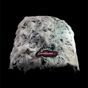 Ghetto Couture Monochrome Noodle Beanies with Distressed Design and Feather Detailing
