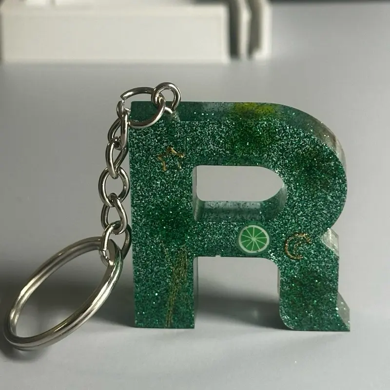 Green Keychain Resin with Flowers and Beautiful Designs - Sparkling Green Letter Design Keychain