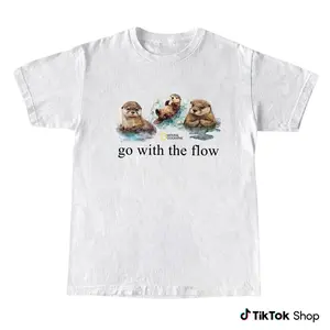 Go With The Flow Otter Graphic T-Shirt, Cute Otter Shirt for Animal Lovers, National Geographic Style Graphic Tee, Trendy Graphic Tees, Vintage T Shirts Casual Streetwear, Surfs Up Graphic Tee Inspired, Men’s Wear Flash Sale