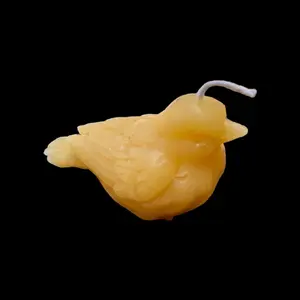 **“Feathered Serenity: Hand-Poured Beeswax Bird Candle"**  This piece evokes the gentle and soothing presence of birds, perfectly suitable for a beautifully crafted candle.