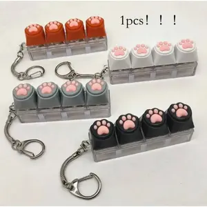 1pc Fingertip Novelty Slow Rising Stress Relief Fidget Toy, Keypad Styled, With Soft Silicone Cat Paw Design Keychain, Pendant