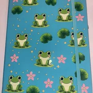 Frog Journal with Adorable Frog Design and Vibrant Blue Background Perfect for Note Taking and Journaling