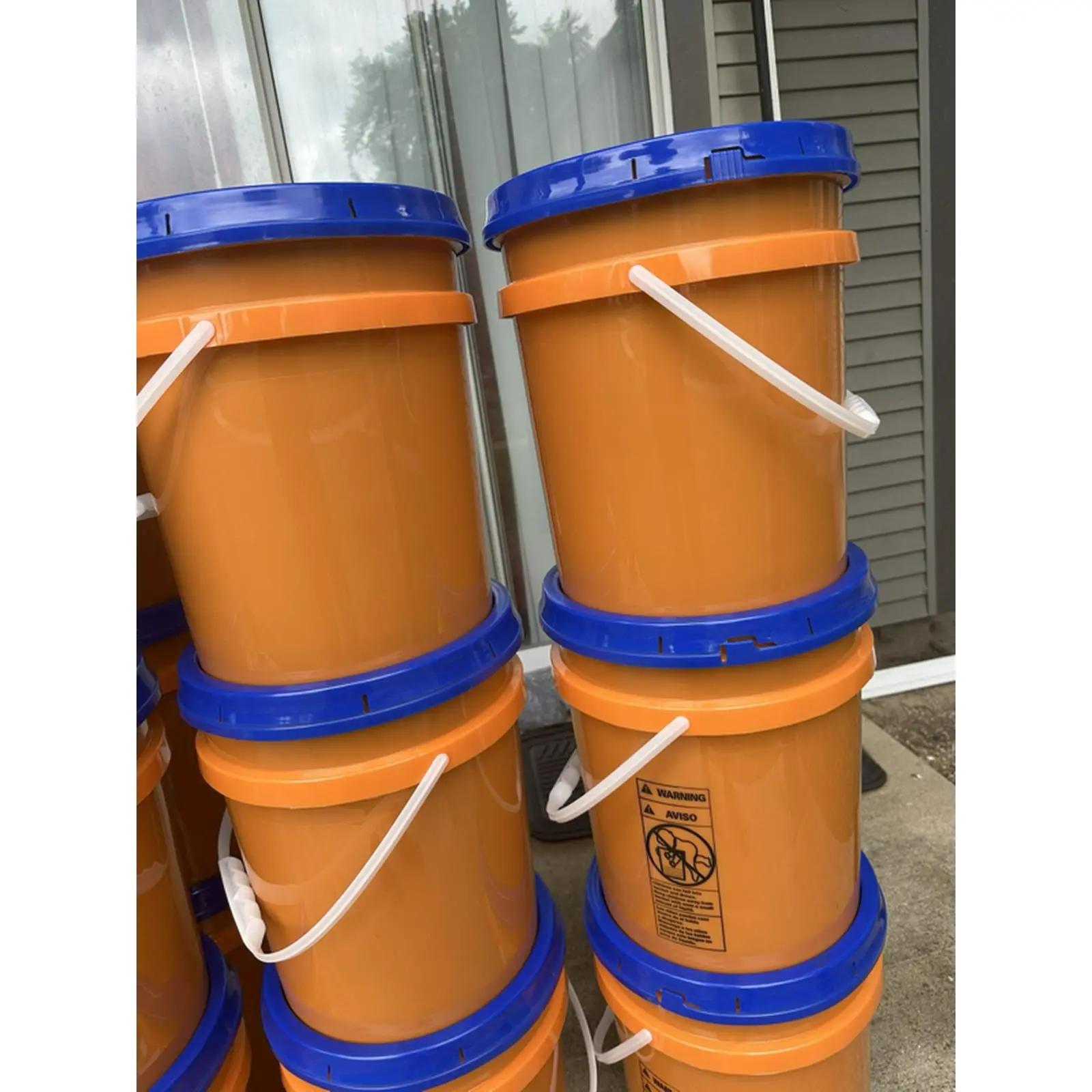 Laundry Detergent Soap Weight 45 - Orange Bucket with Blue Lid and White Handle