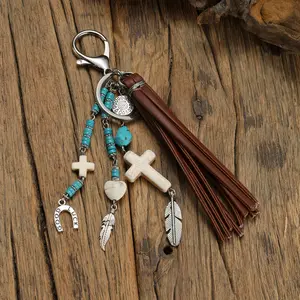 Bohemian Style Heart and Cross Keychain, with Turquoise Beads, PU Leather Tassel, Feather Pendant, and Lobster Clasp – Fashion Jewelry Gift, Suitable for Bags or Keys, Bag Accessories |   Feather Pattern Design |   Turquoise Beads Decoration, Vintage Jewe
