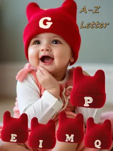 A 0-2Y baby hat. This is a new style children's hat for both boys and girls in autumn and winter, featuring 26-letter pattern, cute ears, a knitted hat for warmth, made of soft and comfortable fabric, Bonnet with Bunny Ears