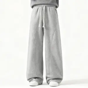 Men's Solid-Color Drawstring Pants with Curved Blade Design—Casual comfort, relaxed fit suitable for all seasons. Street-style men's trousers perfect for everyday wear and layering. Menswear Beige daily wear pant