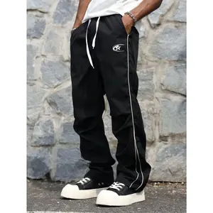 Y2K Track Pants | Black Streetwear Joggers with Star Logo