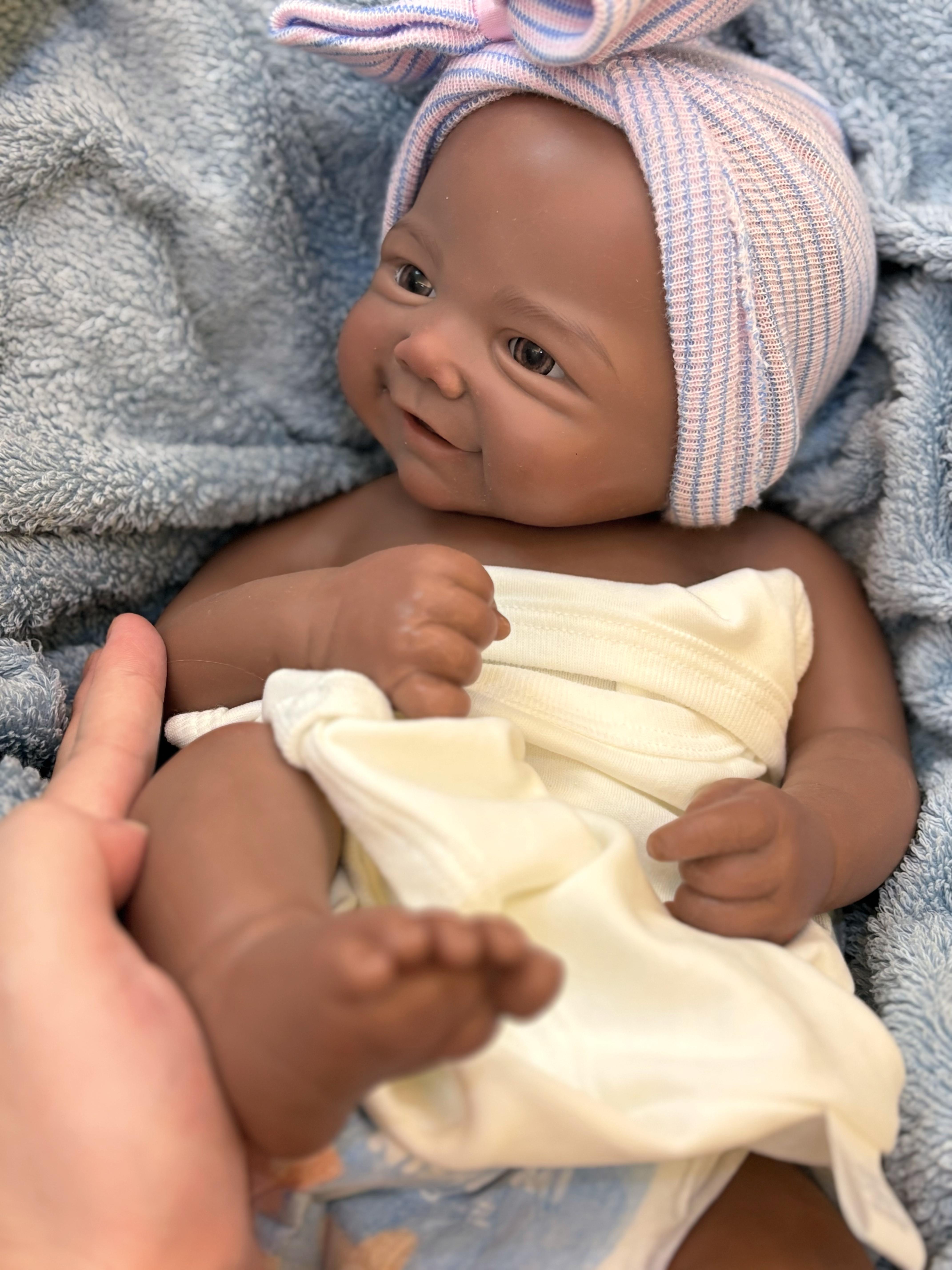 Reborn Doll Soft Silicone 18 inches Lifelike with Happy Smile Brown Skin Soft Body Realistic Details Includes Comfort Item Bottle Birth Certificate Perfect for Birthday Gifts Collectors and Children