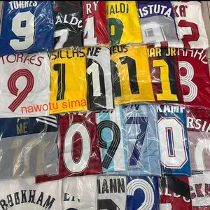 Football jerseys featuring various styles—randomly selected for a surprise gift—perfect for football enthusiasts.