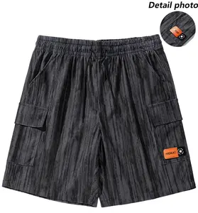 Men’s casual shorts—loose and comfortable, versatile design featuring a trademark graphic, elastic waistband with drawstring, American retro style, suitable for all seasons, ideal for outdoor leisure activities.