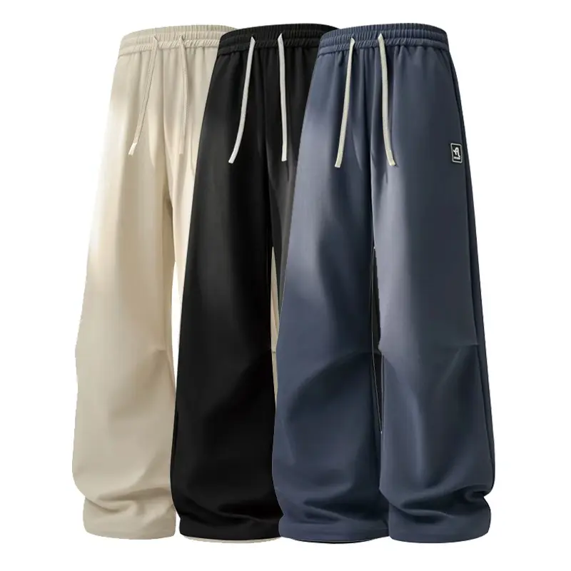 Men's Oversized Wide-Leg Sweatpants – Drawstring Joggers with Rubber Logo Patch; Breathable Textured Fabric Lounge Pants; Street-Style Elastic-Waist Trousers with Back Pocket – Suitable for Fitness and Casual Wear.