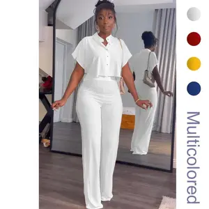 Women’s summer two-piece casual sportswear set featuring a short-sleeved button-up top with an exposed navel and wide-leg pants GARMENTARY