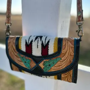 Handcrafted Leather Crossbody Bag with Vibrant Embroidery and Turquoise Accents for Stylish Everyday Use