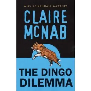 USED-The Dingo Dilemma: A Kylie Kendall Mystery by Claire McNab (Paperback)