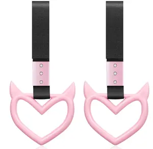 Heart-Shaped Car Accessory with Pink and Black Straps for Stylish Car Decor
