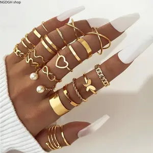 Gold Stackable Rings for Women - Trendy Multi-Style Chunky Set with Infinity Heart Butterfly Pearl Chain, Shiny Waterproof Stainless Steel Adjustable Rings, Perfect for Daily Layering Party Vacation & Statement Nail Looks