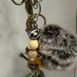 Adorable Keychain with Furry Pom Pom and Highland Cow Charm for Stylish Accessories - Perfect for Adding a Touch of Fun to Your Bag or Keychain