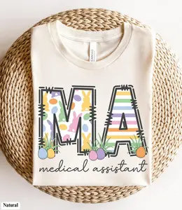 Gildan Heavy Cotton MA Easter Shirt Gift for Medical Assistants, Comfortable Durable Easter Bunny Tee, MA Easter Egg T-Shirt, Spring Graduation Top for Men and Women