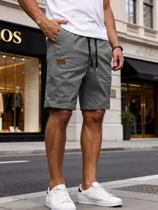 Men's loose Athletic Casual Shorts, featuring drawstrings and decorative patches, with a simple knee-length design. An excellent gift for him, suitable for daily leisure and outdoor activities.