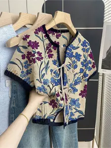 Women's khaki bohemian vacation short-sleeve knit top. Loose round neck, contrast small floral print, front tie and contrast piping. Comfortable for spring & summer casual wear. Casual Boho Blouses