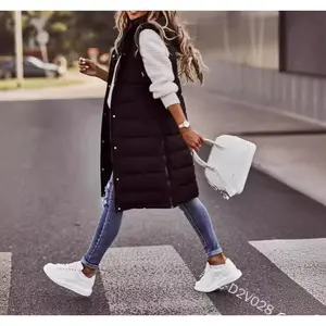 Women’s long down vest, long winter coat style — women’s top/outerwear that can be worn with a raincoat