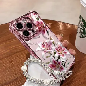 Phone case with pink lily design, compatible with iPhone 11/12/13/14/15/16/17 Pro Max, 14/15/16 Plus, X, & XS Max models, featuring a built-in chrome pink frame and drop protection.